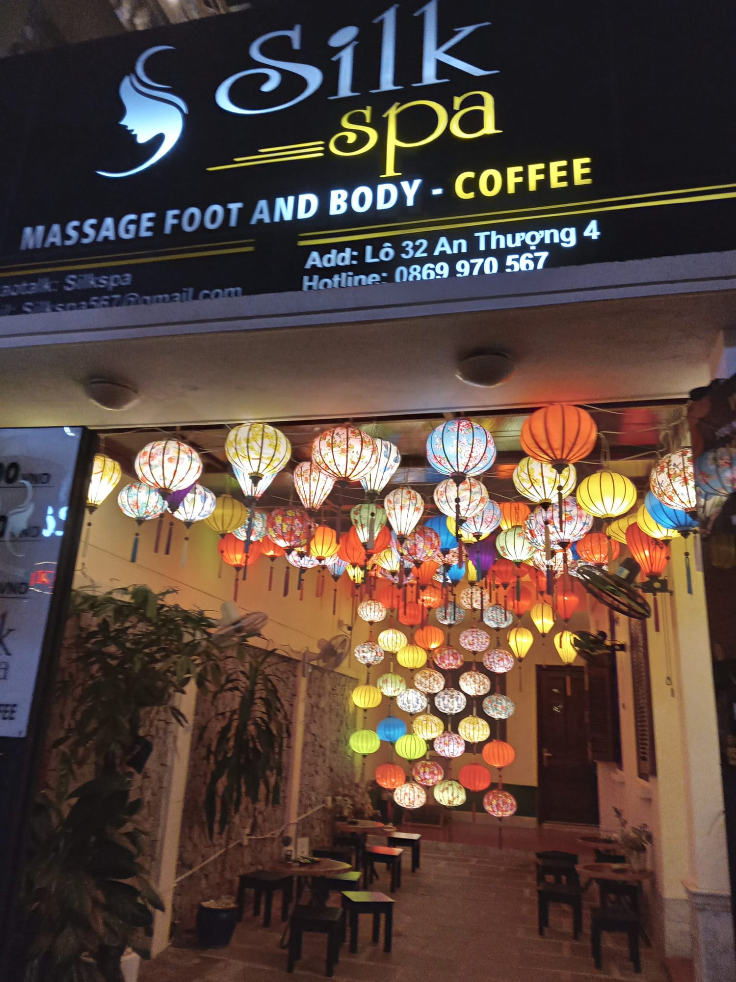 Spa storefront in Da Nang Vietnam, with colourful lanterns hanging from the ceiling