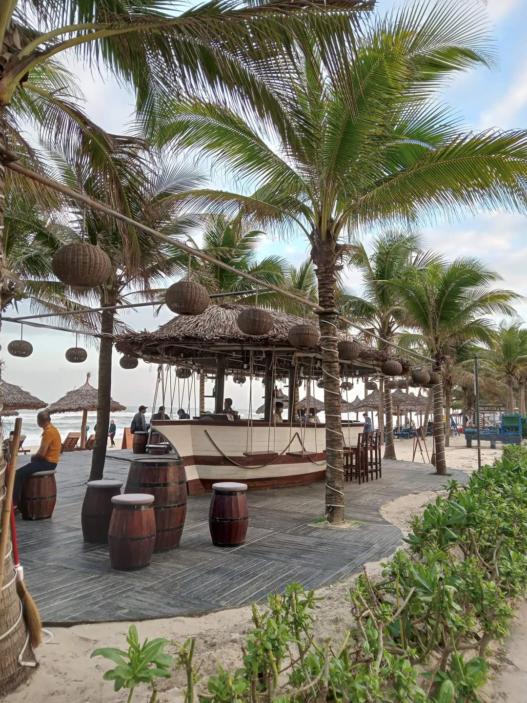 Beach boardwalk views, palm trees and subway entrance in Da Nang, Vietnam