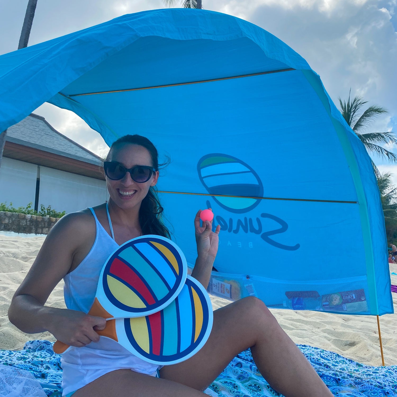 Wooden paddleball game by Suniela Beach