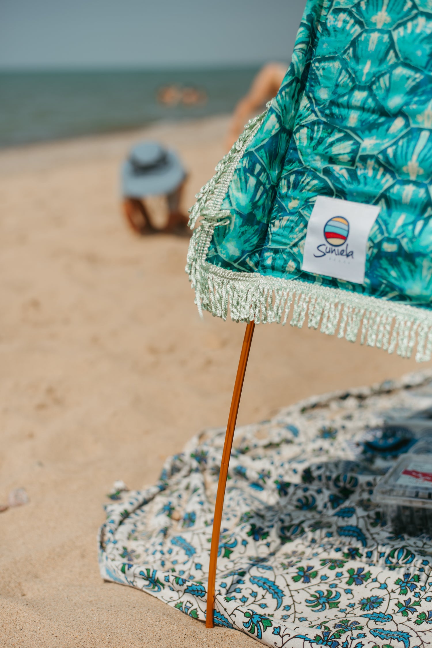 Suniela Beach cotton shade tent with kids playing in the sand