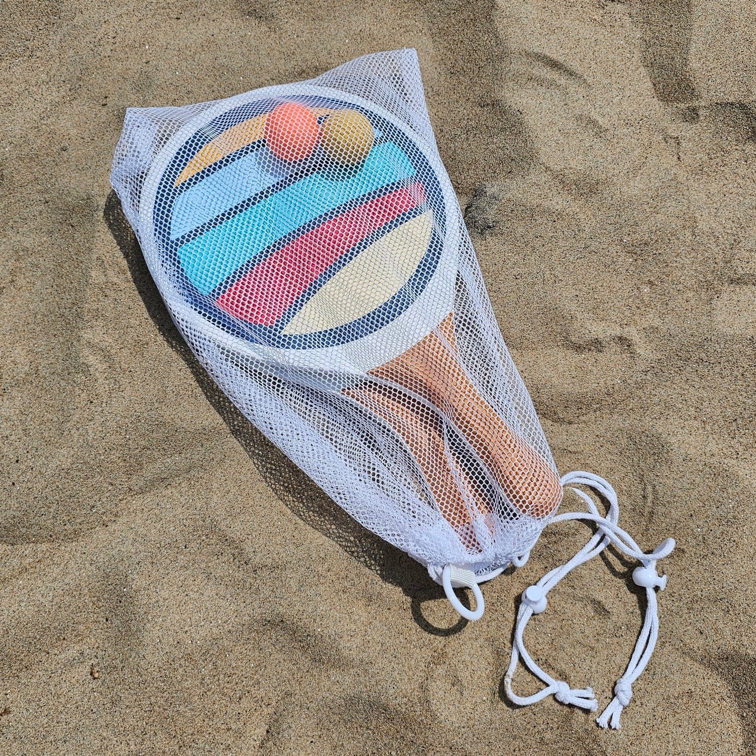 Suniela Beach wooden paddleball game set with orange and yellow ball