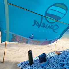 Turquoise Shade Tent with large mesh pockets for personal items_printTurquoiseSuniela